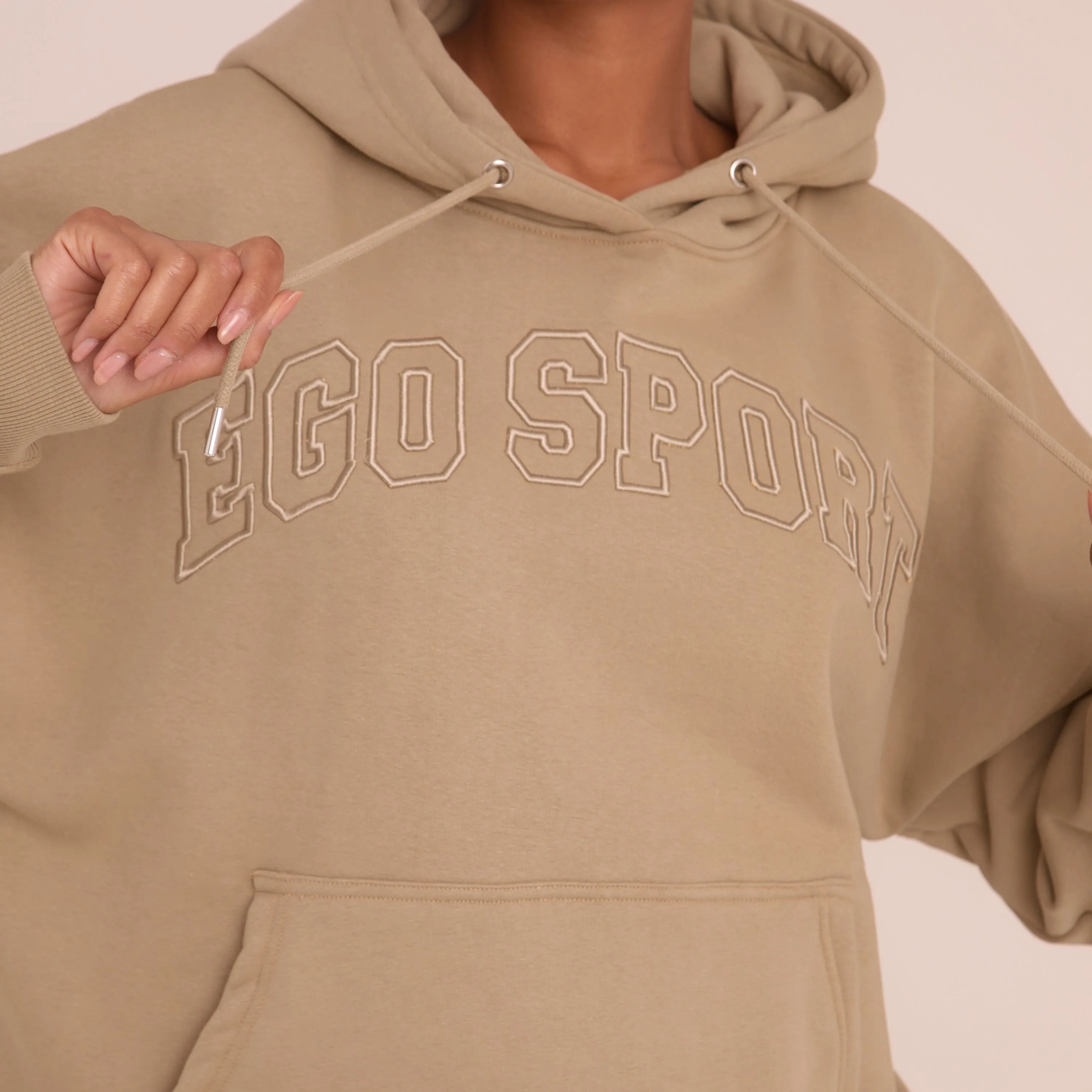 Oversized Ego Embossed Hoodie In Taupe Brown